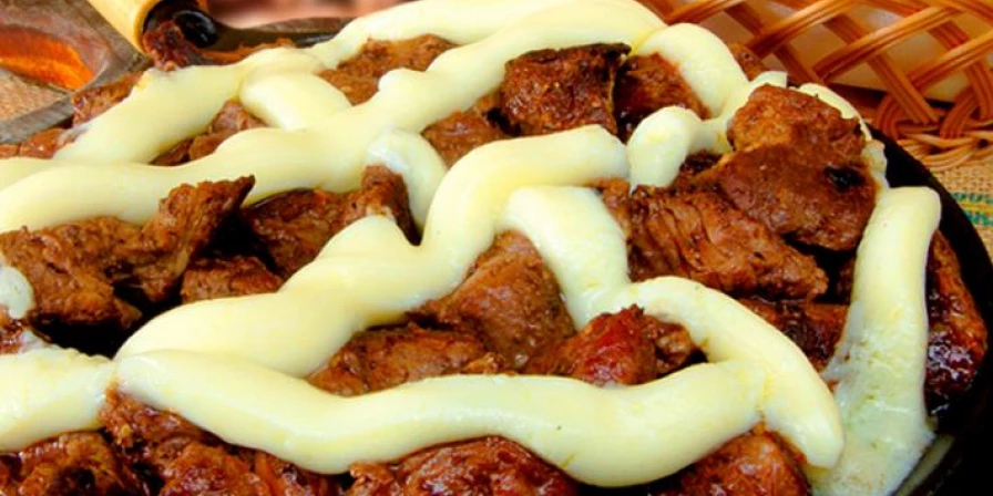 Picanha na manteiga verde.