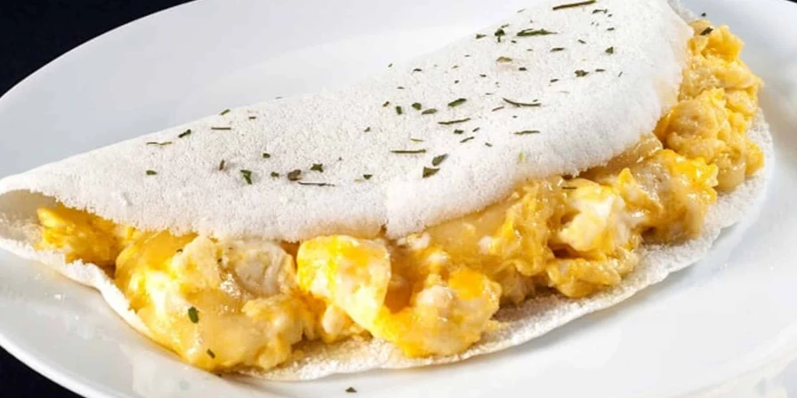 Tapioca com ovo.