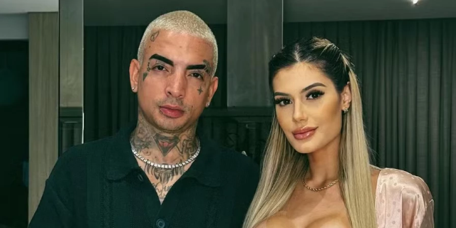 MC Guime ao lado da sua namorada Fernanda Stroschein.