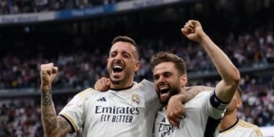 Jogadores do Real fazem a festa com título