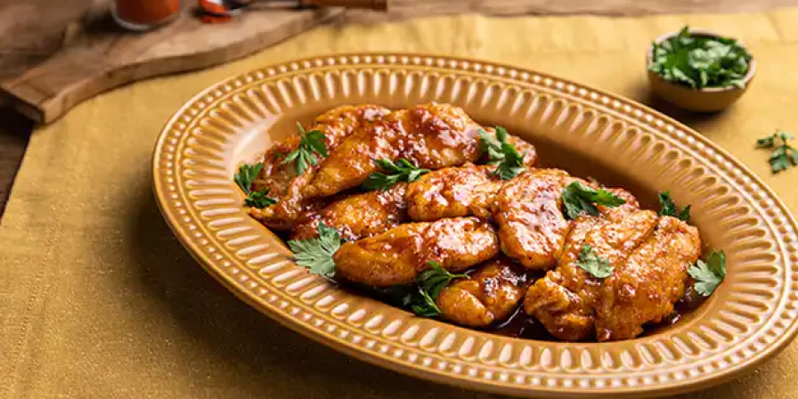 Frango com molho de mel e páprica.