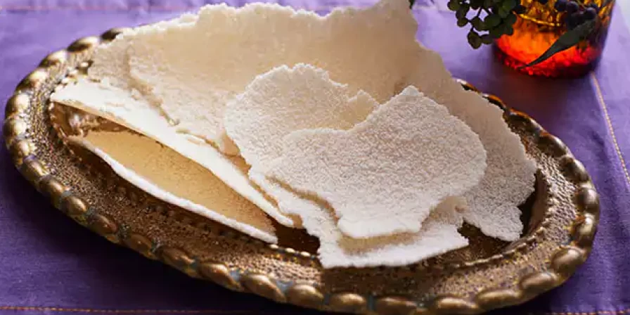 Beiju com parmesão.