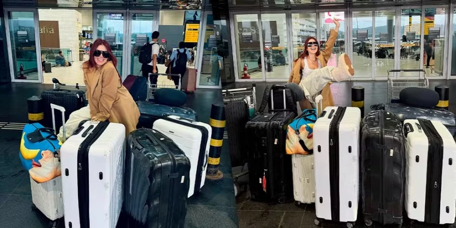 Gkay com grande quantidade de malas em aeroporto